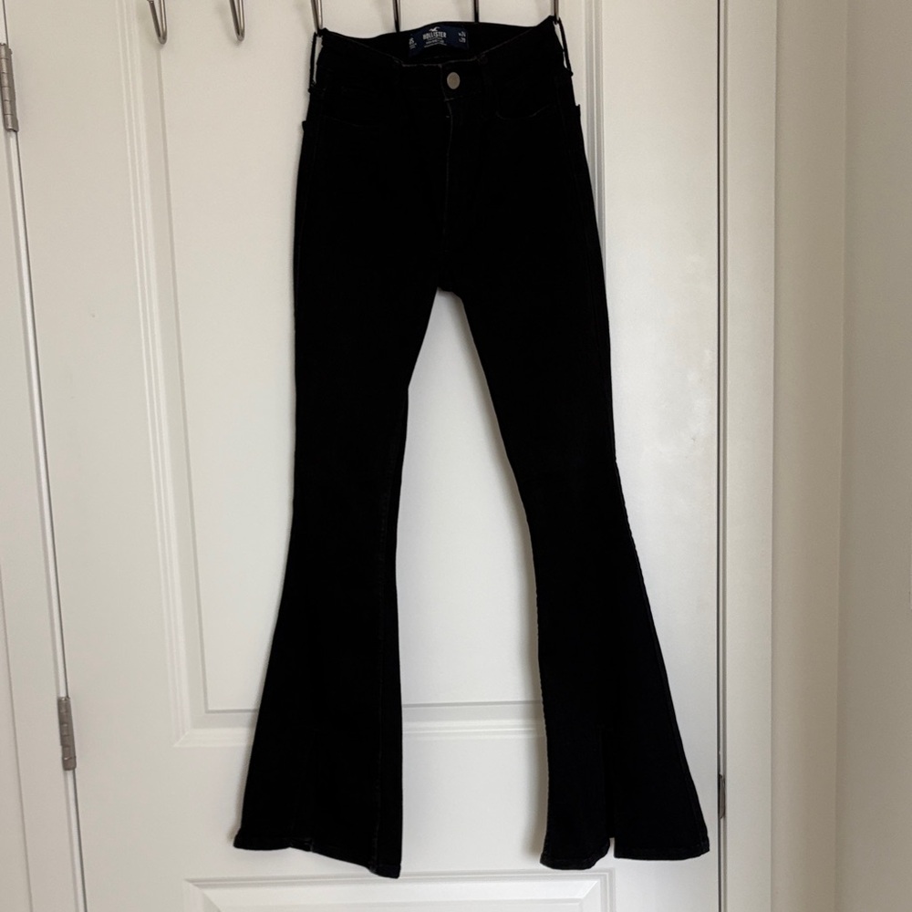 hollister black flared pants with cut / slit on the bottom